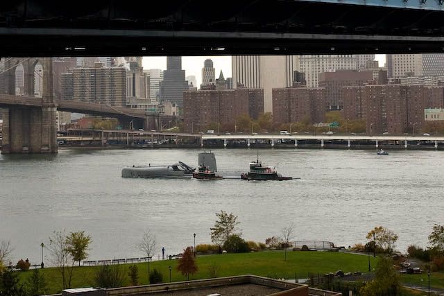 The U.S.S. Growler goes under the Manhattan Bridge.